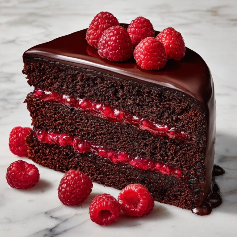 Chocolate Raspberry Layer Cake with Raspberry Frosting and Chocolate Ganache Drip Recipe